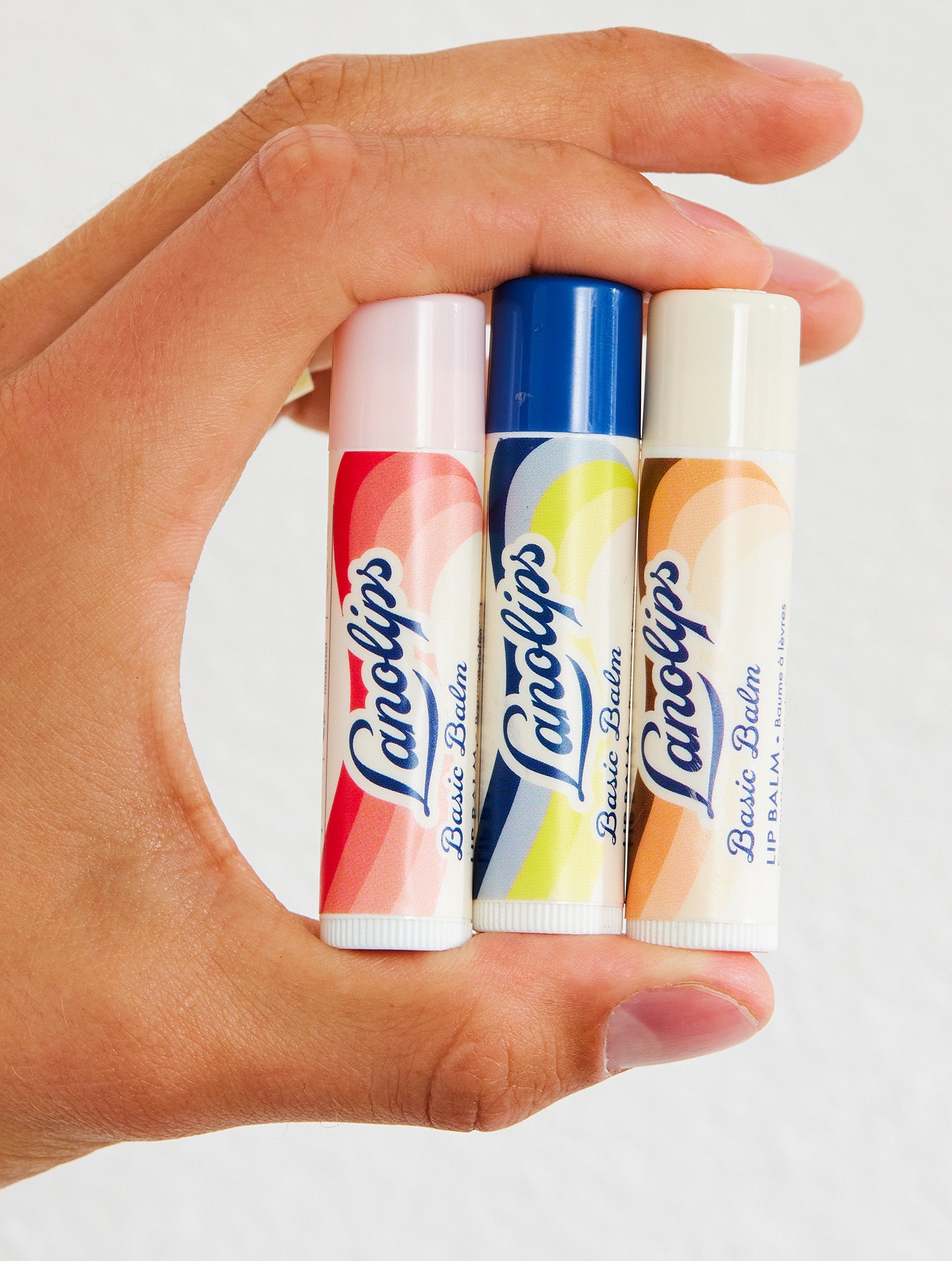 Groups of Lanolips Basic Balm range. 
