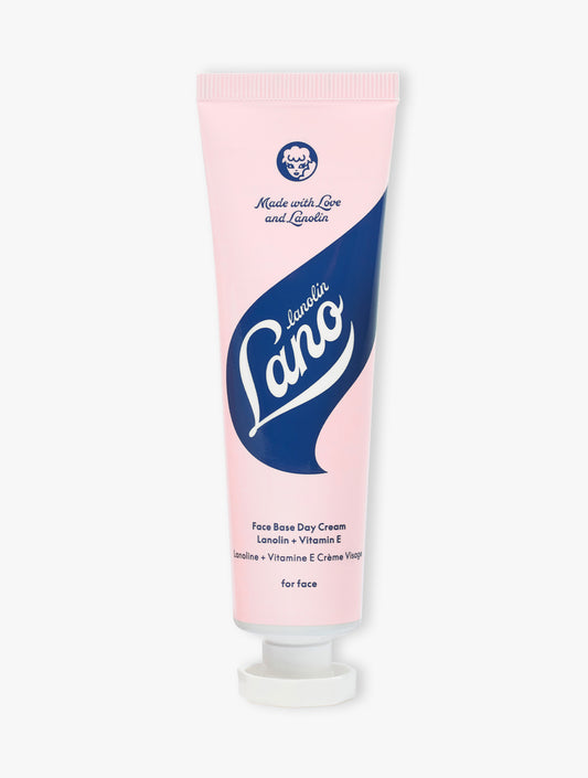 Product Shot of Lanolips Face Base Vitamin E Day Cream Closed Tube. Face Base Vitamin E Day Cream is formulated with lanolin plus vitamin E to replenish and store moisture, leaving a velvety moisture barrier.