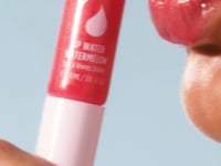 Video showcasing the Lanolips Lip Water Collection in three shades: Original Lip Water, Watermelon, and Liquid Gold. Formulated with liquid lanolin, hyaluronic acid, and glycerin to deeply hydrate lips and leave a soft, glistening finish.